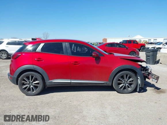 2016 Mazda CX-3 Grand Touring with VIN JM1DKBD71G0112329, listed as a IAAI auction lot 41662610 with 145,329 mi miles. Bid and sale history available at carsss.com. Image 13.