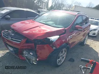 2016 Ford Escape Titanium with VIN 1FMCU0J93GUB11073, listed as a IAAI auction lot 41751349 with 92,000 mi miles. Bid and sale history available at carsss.com. Image 2.