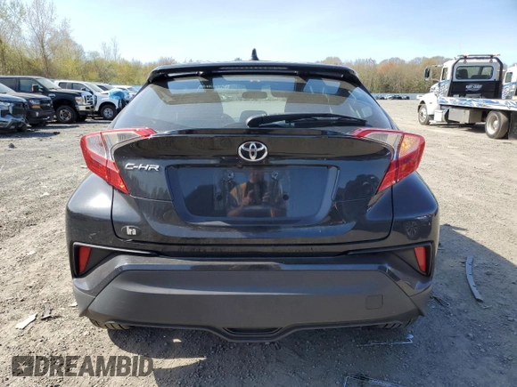 2021 Toyota C-HR LE z VIN NMTKHMBX2MR133802, wystawiony jako Copart lot #54398745 z przebiegiem 152 133 mil mil oraz Szkoda całkowita • Salvage title. Historia ofert i sprzedaży dostępna na DreamBid. Obrazek 6.