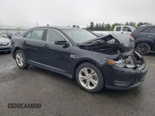 2016 Ford Taurus SEL with VIN 1FAHP2E88GG137607, listed as a Copart auction lot 61356505 with 33,768 mi miles and Salvage title. Bid and sale history available at DreamBid. Image 4.