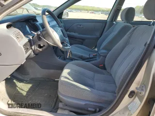 2000 Toyota Camry CE z VIN 4T1BG22K2YU711908, wystawiony jako Copart lot #56294515 z przebiegiem 110 871 mil mil oraz Szkoda całkowita • Salvage title. Historia ofert i sprzedaży dostępna na DreamBid. Obrazek 7.
