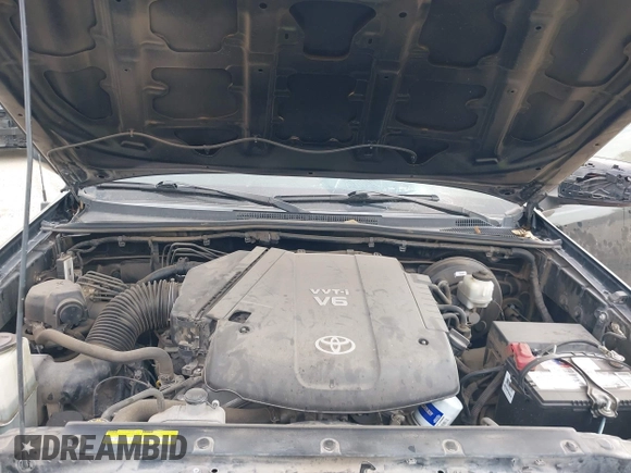 2014 Toyota Tacoma PreRunner with VIN 3TMJU4GN9EM157662, listed as a IAAI auction lot 41952359 with 109,002 mi miles and . Bid and sale history available at DreamBid. Image 10.