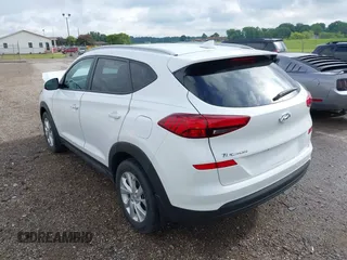 2019 Hyundai Tucson Value z VIN KM8J33A41KU013023, wystawiony jako IAAI lot #42302643 z przebiegiem 41 231 mil mil oraz . Historia ofert i sprzedaży dostępna na DreamBid. Obrazek 3.