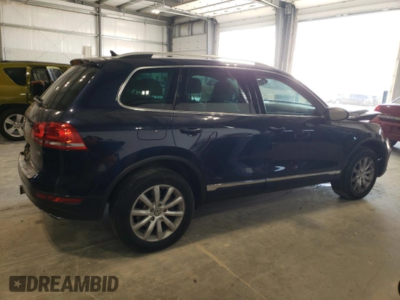 2012 Volkswagen Touareg Sport с VIN WVGEK9BP6CD009633, выставлен на аукционе Copart как лот 85475414 с пробегом 139 872 миль миль и Списание • Salvage title. История ставок и продаж доступна на DreamBid. Изображение 3.