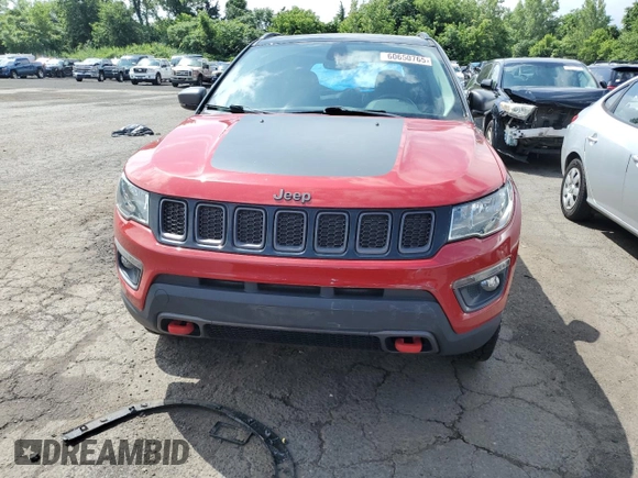 2017 Jeep Compass Trailhawk with VIN 3C4NJDDB7HT657463, listed as a Copart auction lot 60650765 with 100,979 mi miles and Salvage title. Bid and sale history available at DreamBid. Image 5.