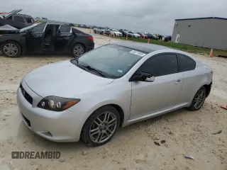 2010 Scion tC z VIN JTKDE3B75A0313196, wystawiony jako Copart lot #50971855 z przebiegiem 87 673 mil mil oraz Szkoda całkowita • Salvage title. Historia ofert i sprzedaży dostępna na DreamBid. Obrazek 1.