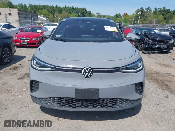 2022 Volkswagen ID.4 Pro S z VIN WVGGNPE24NP059968, wystawiony jako IAAI lot #42210089 z przebiegiem 36 860 mil mil oraz . Historia ofert i sprzedaży dostępna na DreamBid. Obrazek 12.