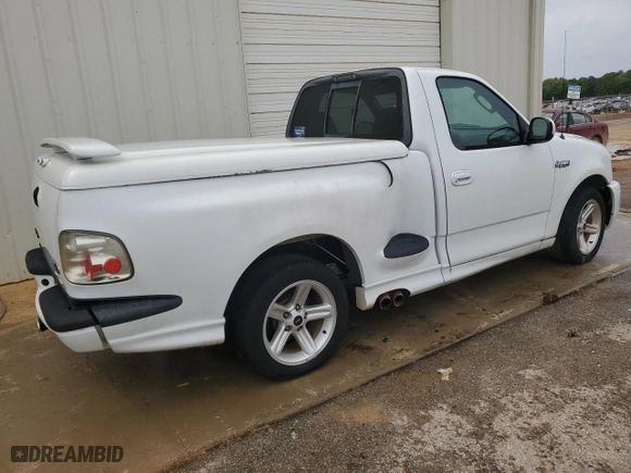 2003 Ford F-150 Lightning with VIN 2FTRF07323CA33701, listed as a Copart auction lot 74562294 with 87,132 mi miles and Clean Title. Bid and sale history available at carsss.com. Image 3.