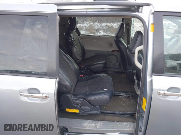 2013 Toyota Sienna SE with VIN 5TDXK3DC0DS354540, listed as a IAAI auction lot 41445501 with 238,814 mi miles and . Bid and sale history available at DreamBid. Image 8.