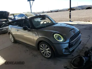 2019 MINI Convertible Cooper S с VIN WMWWG9C54K3E40225, выставлен на аукционе Copart как лот 42201665 с пробегом 56 749 миль миль и Списание • Salvage title. История ставок и продаж доступна на DreamBid. Изображение 4.