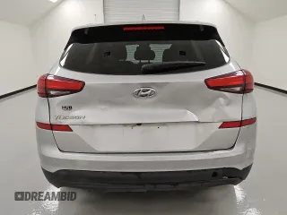 2021 Hyundai Tucson Value with VIN KM8J33A42MU392228, listed as a Copart auction lot 49471815 with 141,637 mi miles and Clean Title. Bid and sale history available at DreamBid. Image 6.