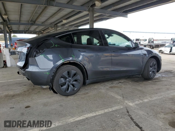 2025 Tesla Model Y Long Range with VIN 7SAYGDED2SF234388, listed as a Copart auction lot 47250965 with 3,702 mi miles and Salvage Title. Bid and sale history available at DreamBid. Image 3.