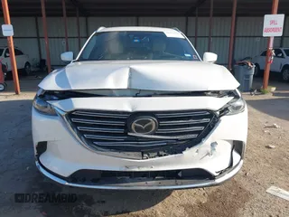 2016 Mazda CX-9 Grand Touring z VIN JM3TCADY6G0125547, wystawiony jako IAAI lot #41997445 z przebiegiem 129 179 mil mil oraz . Historia ofert i sprzedaży dostępna na DreamBid. Obrazek 12.