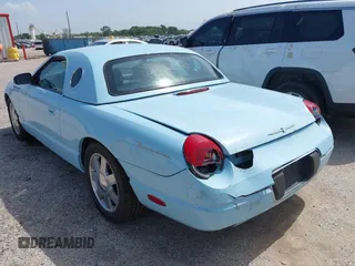 2003 Ford Thunderbird Deluxe z VIN 1FAHP60A53Y101461, wystawiony jako IAAI lot #42519933 z przebiegiem 64 820 mil mil oraz . Historia ofert i sprzedaży dostępna na DreamBid. Obrazek 3.