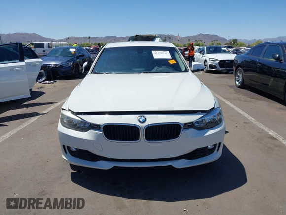 2015 BMW 3 Series 328i with VIN WBA3C1C52FK117753, listed as a IAAI auction lot 42270013 with 147,386 mi miles and . Bid and sale history available at DreamBid. Image 12.