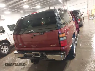 2006 GMC Yukon XL SLT z VIN 3GKFK16Z76G239151, wystawiony jako IAAI lot #41083810 z przebiegiem 177 308 mil mil oraz . Historia ofert i sprzedaży dostępna na DreamBid. Obrazek 16.