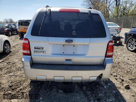 2010 Ford Escape XLS with VIN 1FMCU9C70AKC85380, listed as a Copart auction lot 52868005 with 302,211 mi miles and Clean title. Bid and sale history available at DreamBid. Image 6.