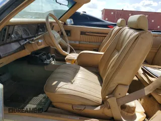 1986 Chrysler LeBaron z VIN 1C3BC55D0GG153072, wystawiony jako Copart lot #77865854 z przebiegiem 74 922 mil mil oraz Szkoda całkowita • Salvage title. Historia ofert i sprzedaży dostępna na DreamBid. Obrazek 7.