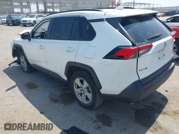 2021 Toyota RAV4 XLE with VIN JTMW1RFV2MD063839, listed as a IAAI auction lot 42406891 with 69,490 mi miles and . Bid and sale history available at DreamBid. Image 3.