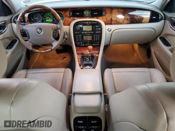 2004 Jaguar XJ with VIN SAJWA71C14SG16264, listed as a Copart auction lot 83251554 with 267,493 mi miles and Salvage Title. Bid and sale history available at carsss.com. Image 8.