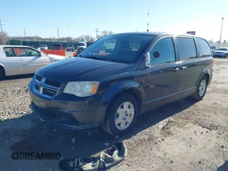 2011 Dodge Grand Caravan SXT with VIN 2D4RN4DGXBR765249, listed as a IAAI auction lot 41097760 with 95,481 mi miles and . Bid and sale history available at DreamBid. Image 17.