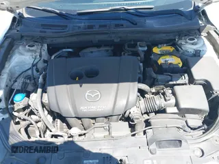 2015 Mazda 3 S Grand Touring with VIN JM1BM1M39F1233093, listed as a IAAI auction lot 42245609 with 137,487 mi miles and . Bid and sale history available at DreamBid. Image 10.