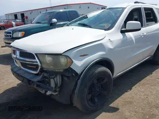2011 Dodge Durango Express with VIN 1D4RE2GG3BC628341, listed as a IAAI auction lot 40093551 with 207,469 mi miles. Bid and sale history available at carsss.com. Image 13.