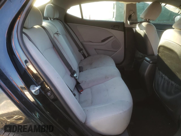 2014 Kia Optima LX z VIN 5XXGM4A71EG277249, wystawiony jako Copart lot #50886935 z przebiegiem 174 002 mil mil oraz Szkoda całkowita • Salvage title. Historia ofert i sprzedaży dostępna na DreamBid. Obrazek 10.