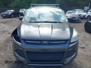 2016 Ford Escape SE с VIN 1FMCU9GX6GUB27794, выставлен на аукционе IAAI как лот 42292204 с пробегом 186 434 миль миль и . История ставок и продаж доступна на DreamBid. Изображение 13.