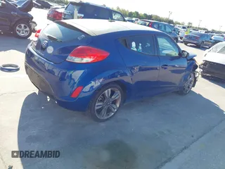 2016 Hyundai Veloster with VIN KMHTC6AD8GU302014, listed as a IAAI auction lot 41764406 with 102,893 mi miles. Bid and sale history available at carsss.com. Image 4.