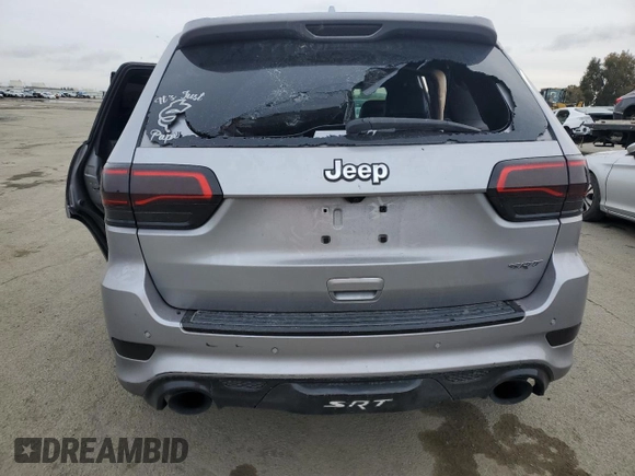 2017 Jeep Grand Cherokee SRT with VIN 1C4RJFDJ8HC663059, listed as a Copart auction lot 45677045 with 88,914 mi miles and Salvage Title. Bid and sale history available at carsss.com. Image 6.