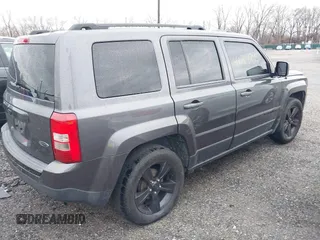 2015 Jeep Patriot Altitude Edition with VIN 1C4NJPBA6FD250698, listed as a IAAI auction lot 41204295 with 224,413 mi miles. Bid and sale history available at carsss.com. Image 4.