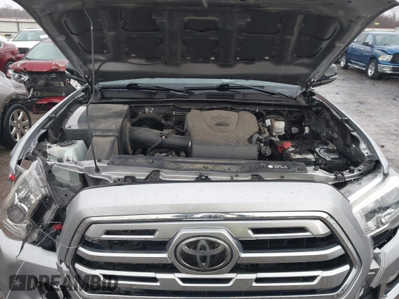 2018 Toyota Tacoma SR with VIN 5TFGZ5AN4JX142565, listed as a IAAI auction lot 41353718 with 87,544 mi miles and . Bid and sale history available at carsss.com. Image 10.