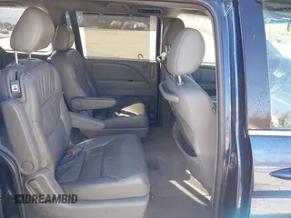 2010 Honda Odyssey EX-L with VIN 5FNRL3H76AB058912, listed as a IAAI auction lot 41558361 with 206,841 mi miles and . Bid and sale history available at DreamBid. Image 8.