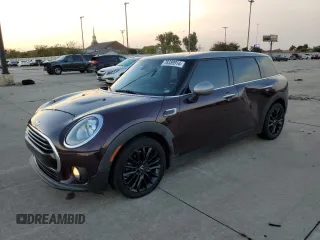 2017 MINI Clubman Cooper with VIN WMWLN5C5XH2E31738, listed as a Copart auction lot 78389914 with 98,387 mi miles and Salvage Title. Bid and sale history available at carsss.com. Image 1.