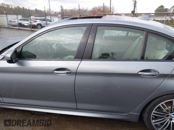 2018 BMW 5 Series 540i xDrive with VIN WBAJE7C52JWC57407, listed as a IAAI auction lot 41805890 with 112,151 mi miles and . Bid and sale history available at DreamBid. Image 14.