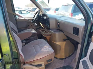 1995 Ford Econoline Cargo with VIN 1FDEE14H5SHB67418, listed as a IAAI auction lot 41551535 with 150,185 mi miles and . Bid and sale history available at DreamBid. Image 5.