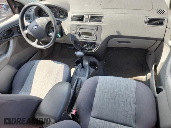 2005 Ford Focus S с VIN 1FAFP34N85W187592, выставлен на аукционе Copart как лот 64759925 с пробегом 27 051 миль миль и Чистый • Clean title. История ставок и продаж доступна на DreamBid. Изображение 8.