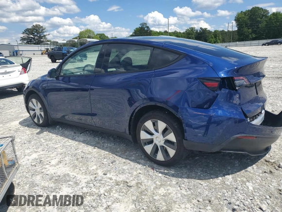 2022 Tesla Model Y Long Range z VIN 7SAYGDEE4NF426893, wystawiony jako Copart lot #55809275 z przebiegiem 16 083 mil mil oraz Szkoda całkowita • Salvage title. Historia ofert i sprzedaży dostępna na DreamBid. Obrazek 2.