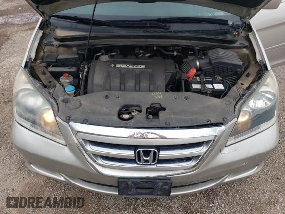 2007 Honda Odyssey EX with VIN 5FNRL38427B513477, listed as a Copart auction lot 62457695 with 216,977 mi miles and Salvage title. Bid and sale history available at DreamBid. Image 12.