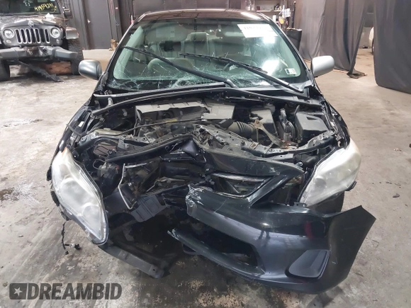 2013 Toyota Corolla L with VIN 2T1BU4EE9DC094853, listed as a IAAI auction lot 41934735 with 122,463 mi miles and . Bid and sale history available at DreamBid. Image 13.