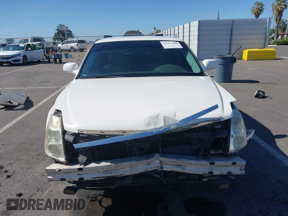 2007 Cadillac DTS Luxury I z VIN 1G6KD57Y77U133267, wystawiony jako IAAI lot #42337188 z przebiegiem 126 063 mil mil oraz . Historia ofert i sprzedaży dostępna na DreamBid. Obrazek 13.