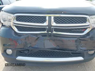 2013 Dodge Durango Crew z VIN 1C4RDJDG3DC685995, wystawiony jako IAAI lot #42490067 z przebiegiem 205 806 mil mil oraz . Historia ofert i sprzedaży dostępna na DreamBid. Obrazek 6.