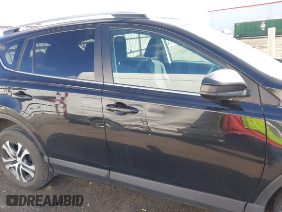 2018 Toyota RAV4 LE with VIN 2T3BFREV2JW749735, listed as a IAAI auction lot 41998068 with 112,468 mi miles. Bid and sale history available at carsss.com. Image 13.