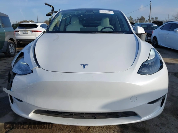 2023 Tesla Model Y Performance with VIN 7SAYGDEF0PF839468, listed as a IAAI auction lot 41609263 with 25,434 mi miles and . Bid and sale history available at DreamBid. Image 13.