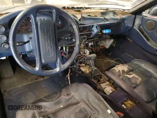 1984 Porsche 928 z VIN WP0JB0925ES861303, wystawiony jako Copart lot #41979575 z przebiegiem 114 593 mil mil oraz Nie do naprawy. Historia ofert i sprzedaży dostępna na DreamBid. Obrazek 8.
