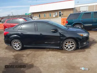 2015 Ford Focus SE with VIN 1FADP3F26FL356554, listed as a IAAI auction lot 41773139 with 143,911 mi miles. Bid and sale history available at carsss.com. Image 13.