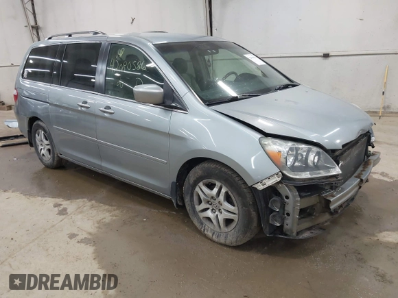 2006 Honda Odyssey EX with VIN 5FNRL38446B044231, listed as a IAAI auction lot 42080586 with 211,908 mi miles. Bid and sale history available at carsss.com. Image 1.