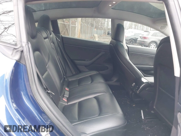 2019 Tesla Model 3 Long Range with VIN 5YJ3E1EB9KF454007, listed as a IAAI auction lot 41769346 with 141,609 mi miles. Bid and sale history available at carsss.com. Image 8.