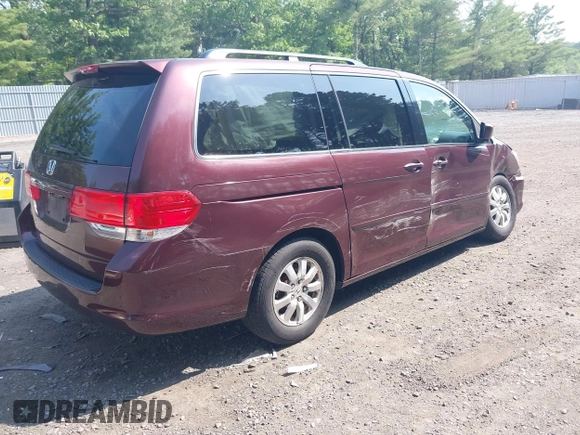 2010 Honda Odyssey EX with VIN 5FNRL3H43AB036890, listed as a IAAI auction lot 42492581 with 103,216 mi miles and . Bid and sale history available at DreamBid. Image 4.